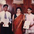 Mrs. Nonis giving Scholarships for University to Plantation workers' Children